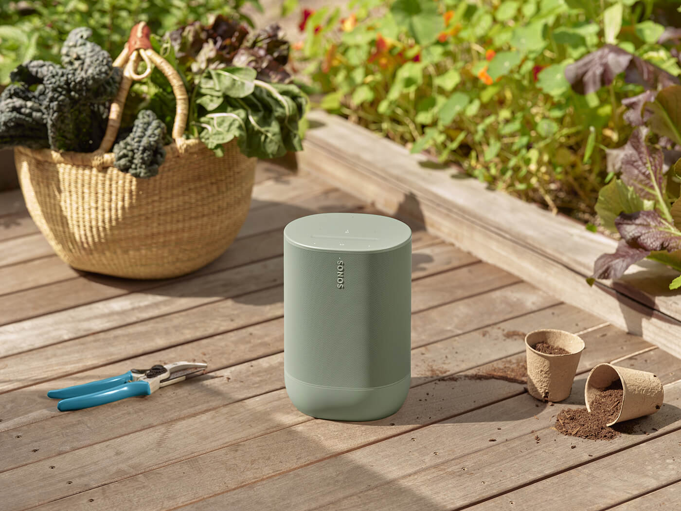 Sonos Move 2 in Olive, in use outdoors